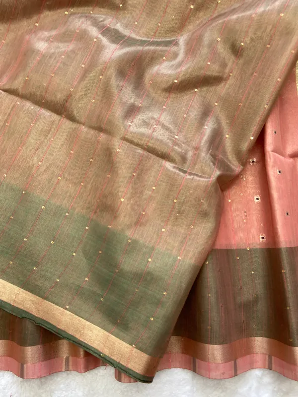 Soft_Tissue_Linen_Silk_sarees_with_Beautiful_Weaving_With_Attractive_Border_&_Rich_Pallu_With_Sequence_And_Running_Blouse_With_Tassels