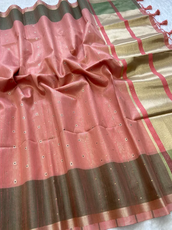 Soft_Tissue_Linen_Silk_sarees_with_Beautiful_Weaving_With_Attractive_Border_&_Rich_Pallu_With_Sequence_And_Running_Blouse_With_Tassels