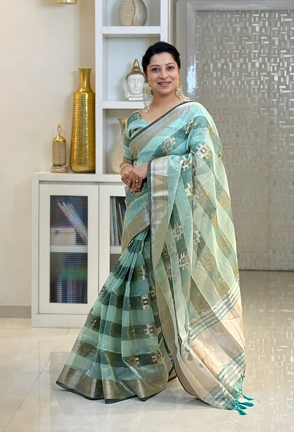 Yatika_Rama_Green_–_Diwali_Special_|_Soft_Tissue_Silk_Saree_with_Weaving_Zari_Work,_Border_&_Rich_Pallu_&_Running_Blouse_with_Tassels