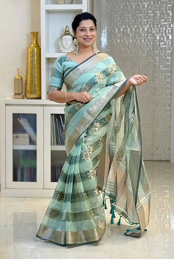 Yatika_Rama_Green_–_Diwali_Special_|_Soft_Tissue_Silk_Saree_with_Weaving_Zari_Work,_Border_&_Rich_Pallu_&_Running_Blouse_with_Tassels