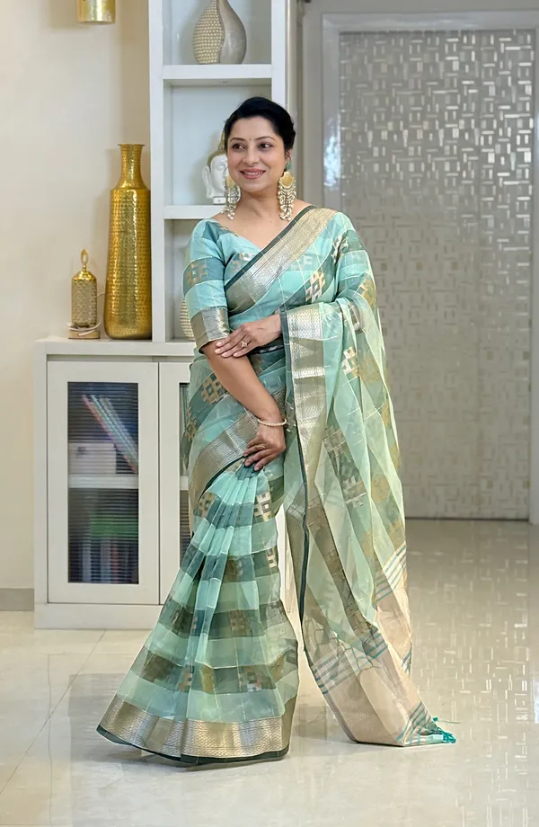 Yatika_Rama_Green_–_Diwali_Special_|_Soft_Tissue_Silk_Saree_with_Weaving_Zari_Work,_Border_&_Rich_Pallu_&_Running_Blouse_with_Tassels