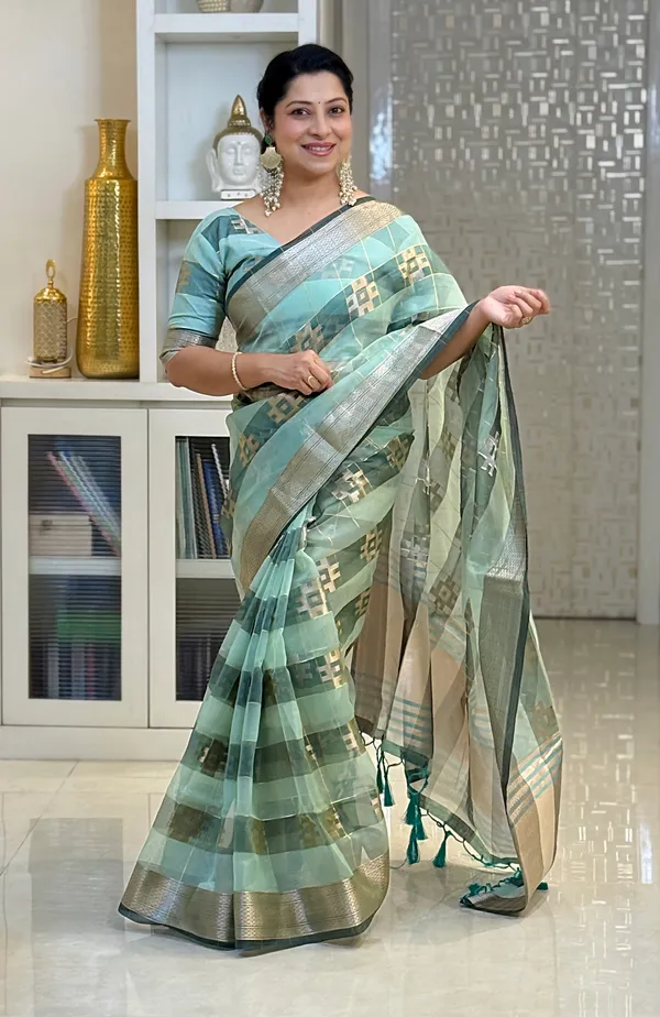 Yatika_Rama_Green_–_Diwali_Special_|_Soft_Tissue_Silk_Saree_with_Weaving_Zari_Work,_Border_&_Rich_Pallu_&_Running_Blouse_with_Tassels