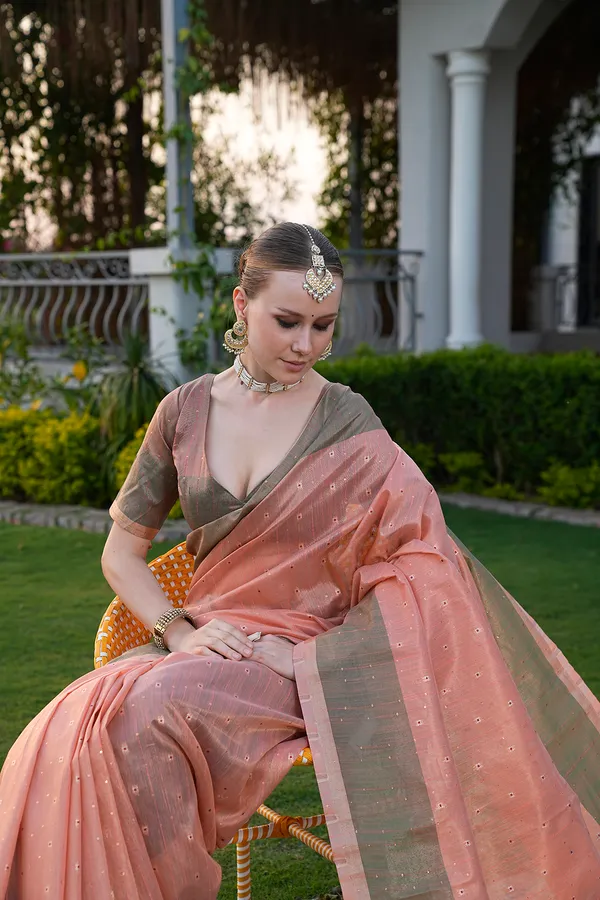 Sarika_Orange_–_Diwali_Special_|_Soft_Tissue_Linen_Silk_Saree_with_Weaving,_Border_&_Rich_Pallu,_Sequence_&_Running_Blouse_with_Tassels