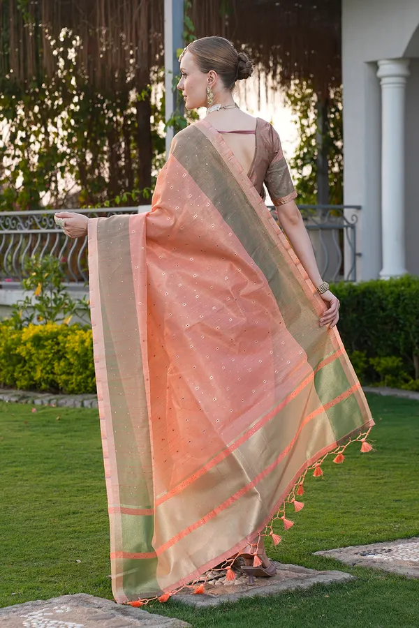 Sarika_Orange_–_Diwali_Special_|_Soft_Tissue_Linen_Silk_Saree_with_Weaving,_Border_&_Rich_Pallu,_Sequence_&_Running_Blouse_with_Tassels
