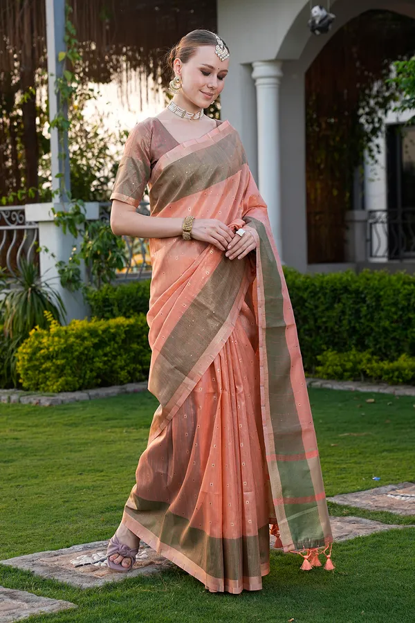 Sarika_Orange_–_Diwali_Special_|_Soft_Tissue_Linen_Silk_Saree_with_Weaving,_Border_&_Rich_Pallu,_Sequence_&_Running_Blouse_with_Tassels