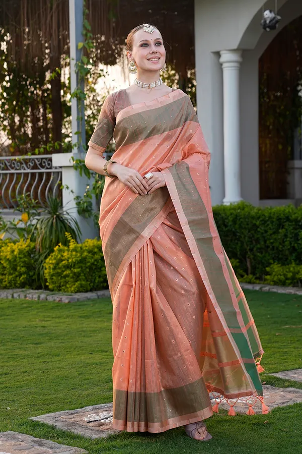 Sarika_Orange_–_Diwali_Special_|_Soft_Tissue_Linen_Silk_Saree_with_Weaving,_Border_&_Rich_Pallu,_Sequence_&_Running_Blouse_with_Tassels