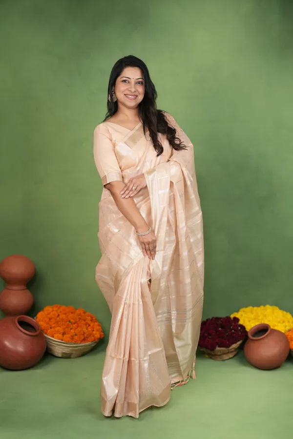 Soft_Linen_Cotton_Silk_sarees_with_Beautiful_Weaving__Zari_Butti_Design_With_Attractive_Border_&_Rich_Pallu__And_Running__Plain_Blouse_With_Tassels