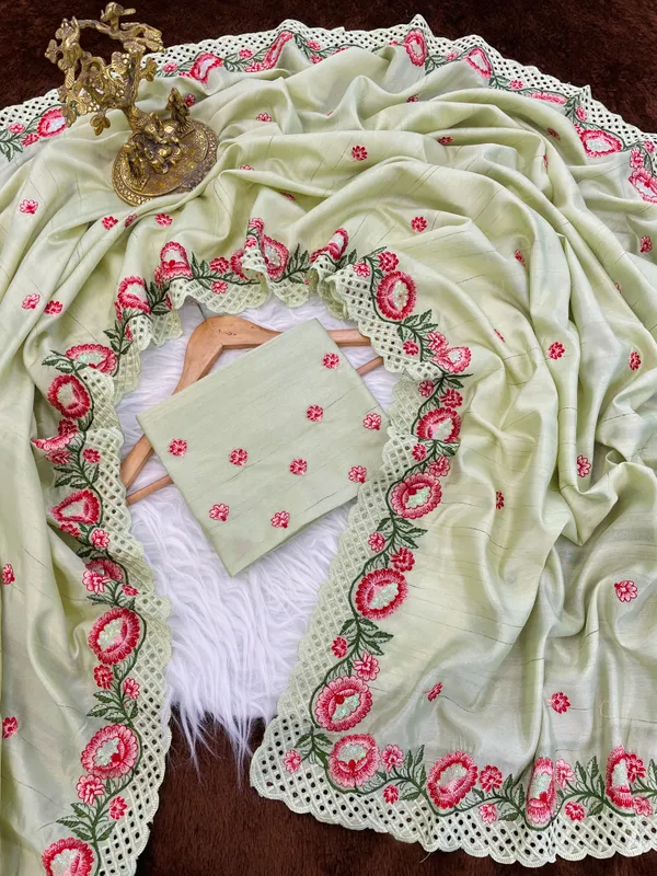 Hamsini_Pista_Green_–_Swan_Graceful_Diwali_Special_|_Heavy_Tussar_Silk_Saree_with_Embroidery_&_Sequence_Work,_Cutwork_Border_&_Heavy_Embroidery