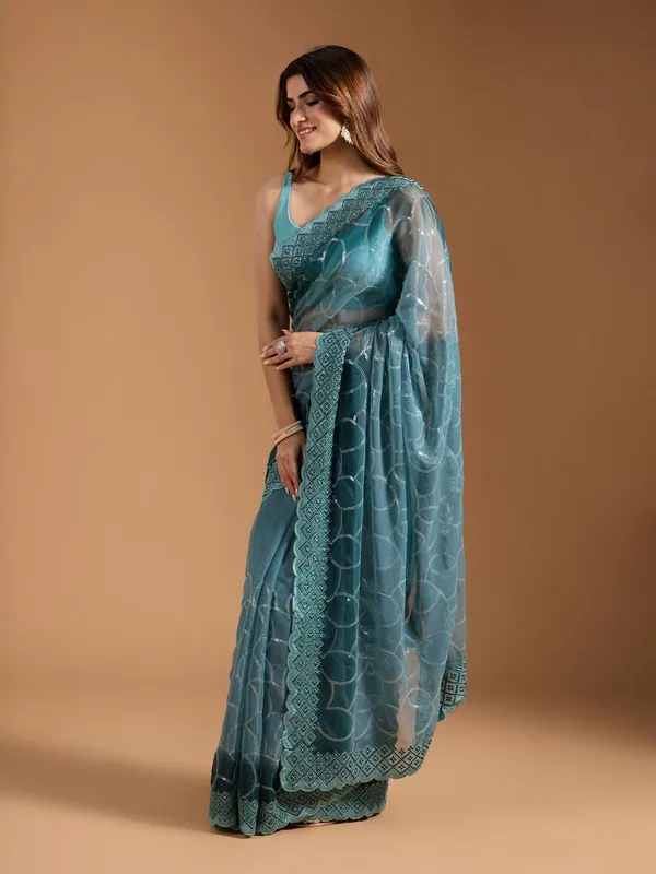 Amiya_Rama_Green_No.4_–_Nectar_Diwali_Special_|_Shimmer_Sitara_Pending_Fabric_Saree_with_Embroidery_&_Sequence_Work,_Cutwork_Border_&_Heavy_Embroidery