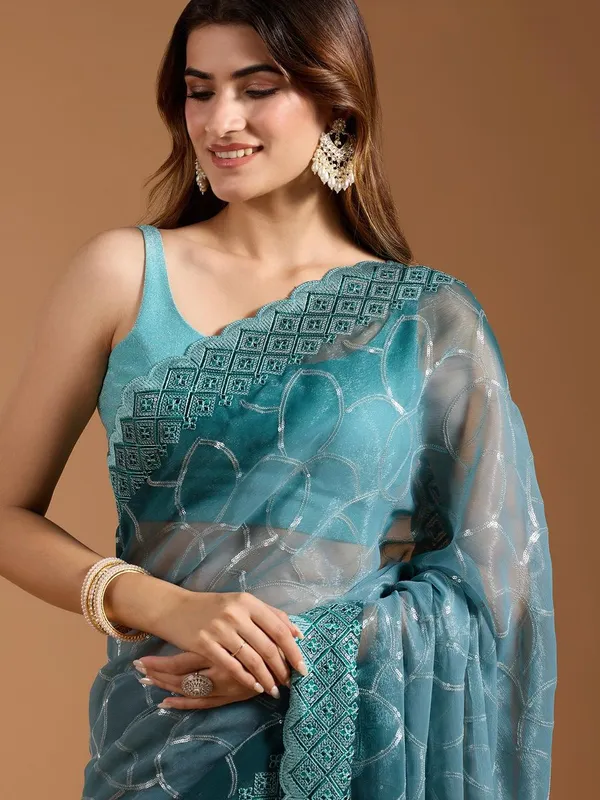 Amiya_Rama_Green_No.4_–_Nectar_Diwali_Special_|_Shimmer_Sitara_Pending_Fabric_Saree_with_Embroidery_&_Sequence_Work,_Cutwork_Border_&_Heavy_Embroidery