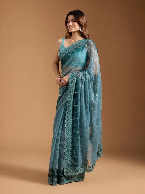 Amiya_Rama_Green_No.4_–_Nectar_Diwali_Special_|_Shimmer_Sitara_Pending_Fabric_Saree_with_Embroidery_&_Sequence_Work,_Cutwork_Border_&_Heavy_Embroidery