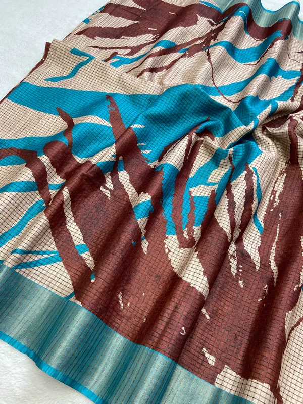 Aarathi_Coffee_Brown_&_Sky_Blue_–_Aarti_Glow_Diwali_Special_|_Soft_Tussar_Silk_Saree_with_Digital_Print,_Checks_Design_Saree_&_Digital_Print_Blouse