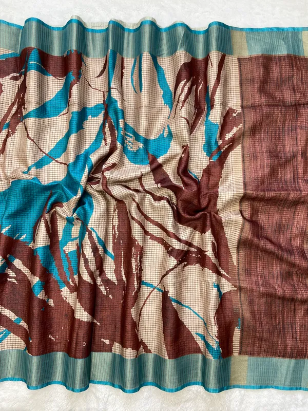 Aarathi_Coffee_Brown_&_Sky_Blue_–_Aarti_Glow_Diwali_Special_|_Soft_Tussar_Silk_Saree_with_Digital_Print,_Checks_Design_Saree_&_Digital_Print_Blouse