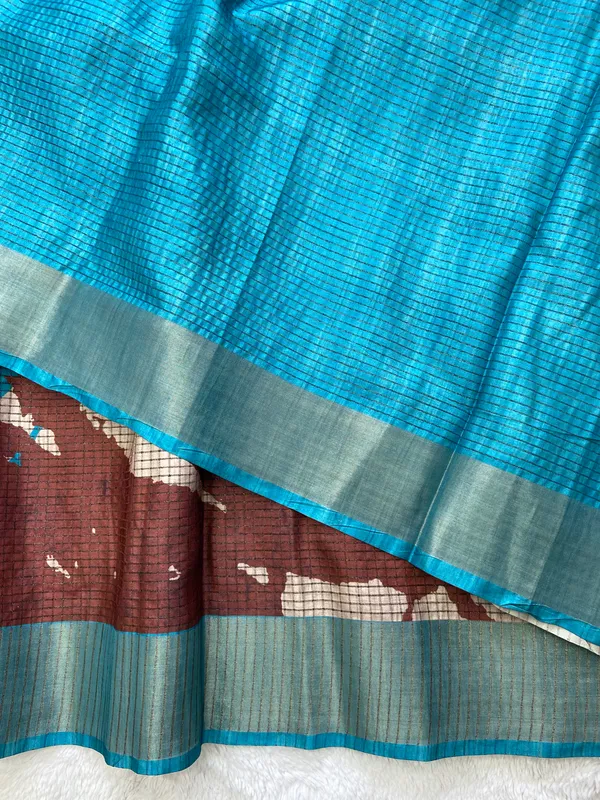 Aarathi_Coffee_Brown_&_Sky_Blue_–_Aarti_Glow_Diwali_Special_|_Soft_Tussar_Silk_Saree_with_Digital_Print,_Checks_Design_Saree_&_Digital_Print_Blouse