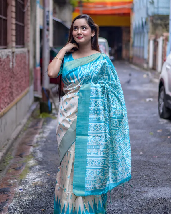 Soft_Tussar_Silk_sarees_with_Beautiful_Print_With_Attractive_Border_And_Contrast_Print_Blouse_With_Tassels