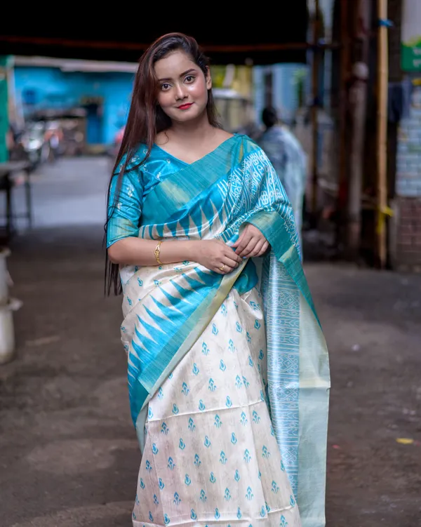 Soft_Tussar_Silk_sarees_with_Beautiful_Print_With_Attractive_Border_And_Contrast_Print_Blouse_With_Tassels