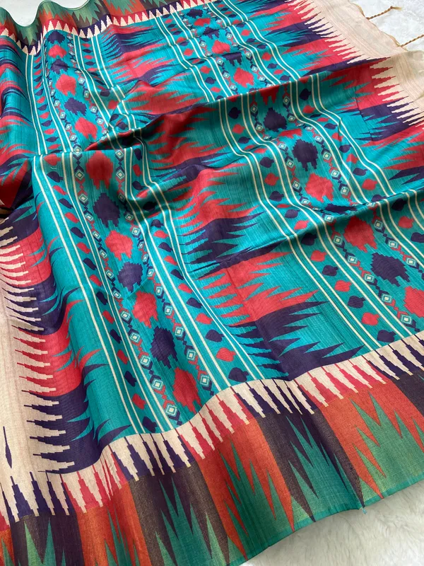 Manasvi_Rama_Green_–_Noble_Hearted_Navratri_Special_|_Soft_Tussar_Silk_Saree_with_Print,_Border_&_Contrast_Print_Blouse_with_Tassels
