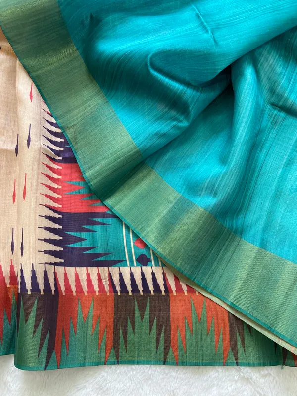 Manasvi_Rama_Green_–_Noble_Hearted_Navratri_Special_|_Soft_Tussar_Silk_Saree_with_Print,_Border_&_Contrast_Print_Blouse_with_Tassels
