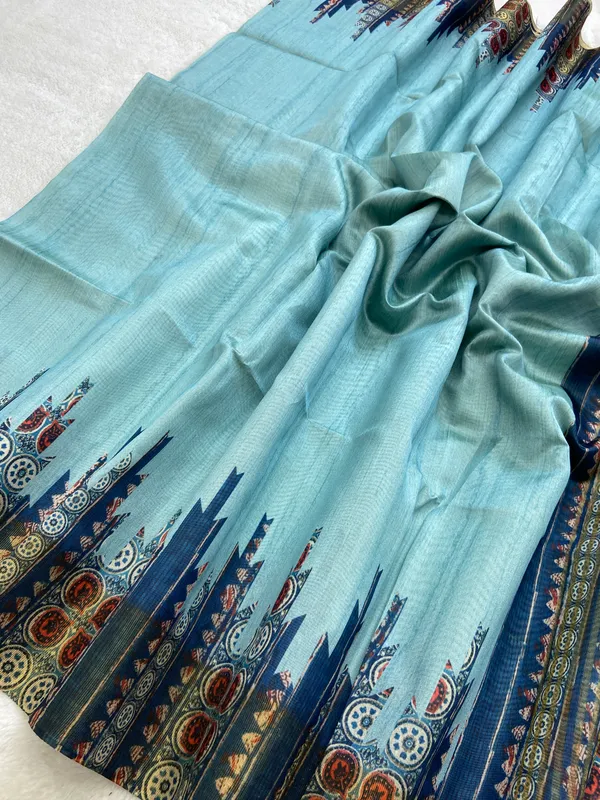 Soft_Tussar_Silk_sarees_with_Beautiful_Print_With_Attractive_Border_And_Contrast_Print_Blouse_With_Tassels