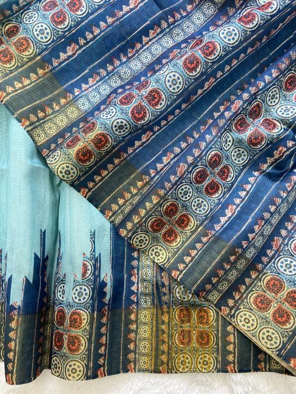 Soft_Tussar_Silk_sarees_with_Beautiful_Print_With_Attractive_Border_And_Contrast_Print_Blouse_With_Tassels
