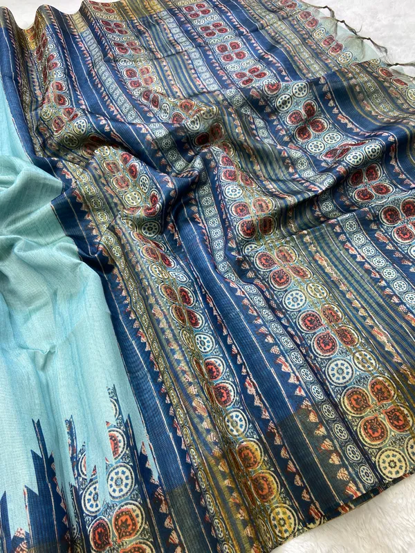 Soft_Tussar_Silk_sarees_with_Beautiful_Print_With_Attractive_Border_And_Contrast_Print_Blouse_With_Tassels