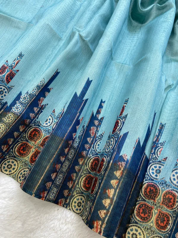 Soft_Tussar_Silk_sarees_with_Beautiful_Print_With_Attractive_Border_And_Contrast_Print_Blouse_With_Tassels