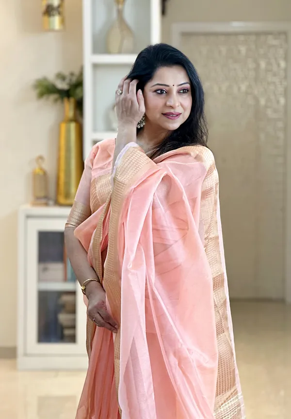 Soft_Tissue_Silk_sarees_with_Beautiful_Weaving_With_Attractive_Border_&_Rich_Pallu_With_Sequence_And_Running_Blouse_With_Tassels