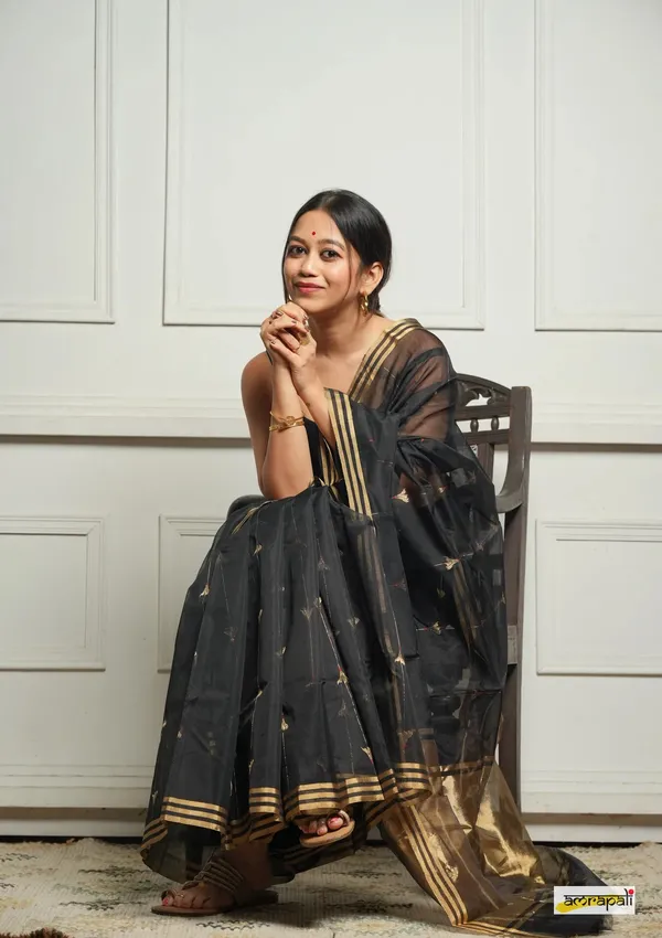 Imaginative_Black_Cotton_Silk_Saree_With_Desirable_Blouse_Piece