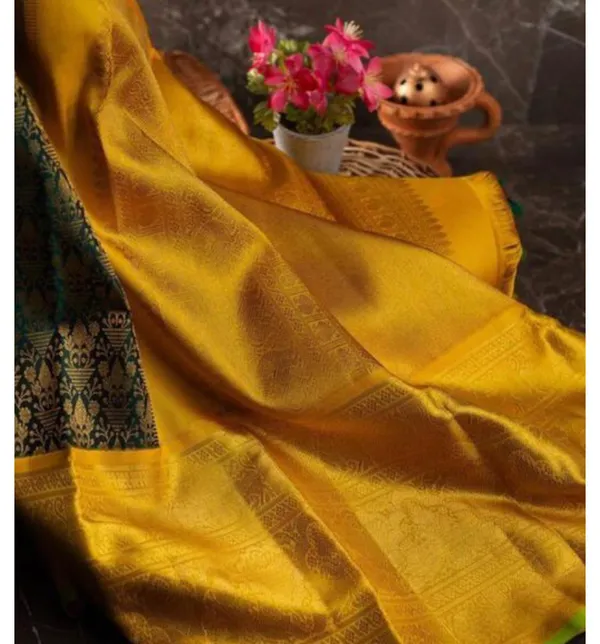 Attractive_Yellow_Soft_Silk_Saree_With_Pretty_Blouse_Piece