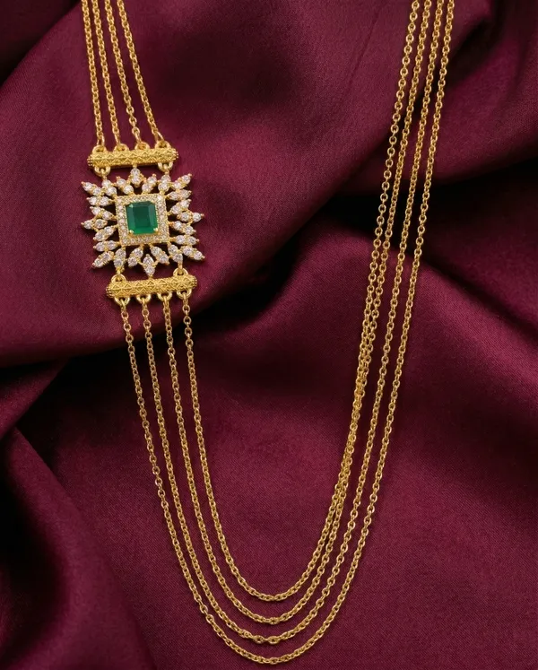 Luxury_Multi-Strand_Gold_Chain_Necklace_with_Royal_Green_Emerald_Side_Pendant