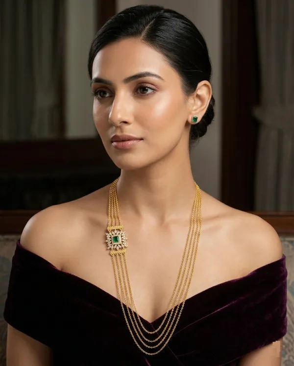 Luxury_Multi-Strand_Gold_Chain_Necklace_with_Royal_Green_Emerald_Side_Pendant