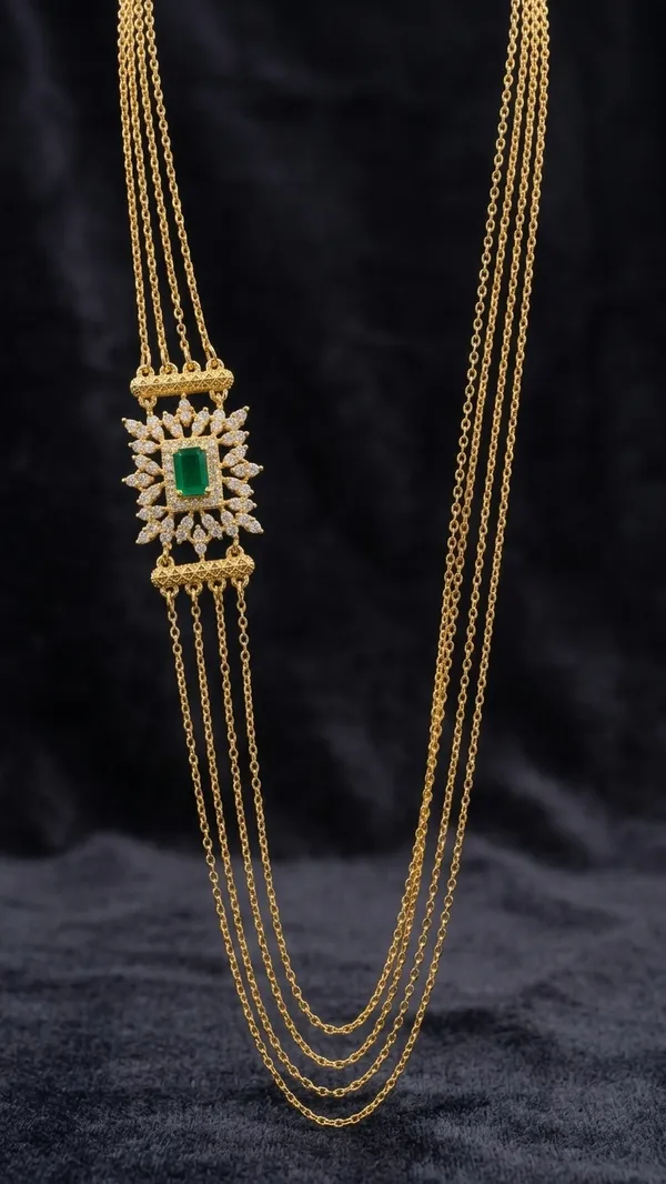 Luxury_Multi-Strand_Gold_Chain_Necklace_with_Royal_Green_Emerald_Side_Pendant