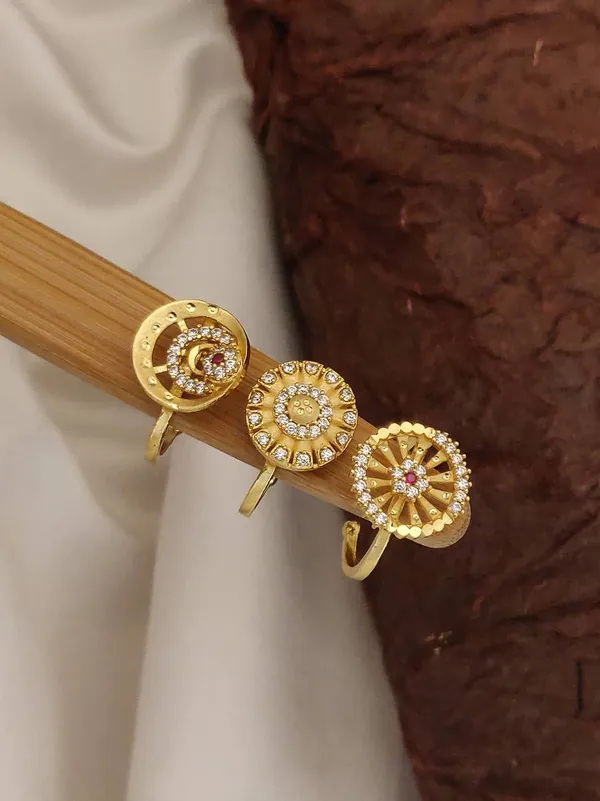 Assorted_Gold-Toned_Rings:_A_Collection_of_Modern_and_Traditional_Designs