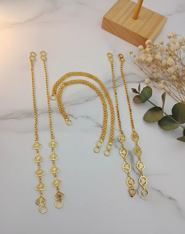 Assortment_of_Gold_Earring_Chains_Featuring_Heart_and_Floral_Charms