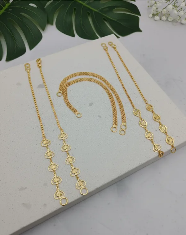 Assortment_of_Gold_Earring_Chains_Featuring_Heart_and_Floral_Charms