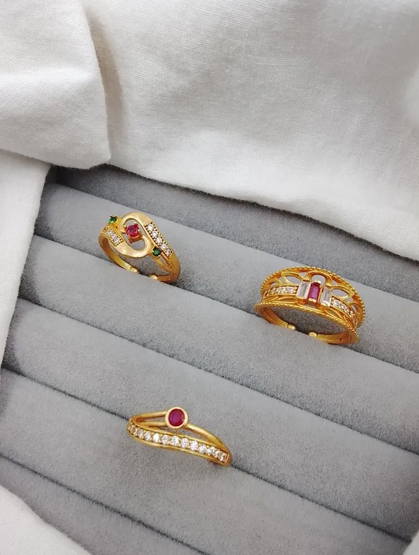 Classic_&_Contemporary_Gold_Ring_Trio_|_Heart,_Baguette,_and_Wave_Designs