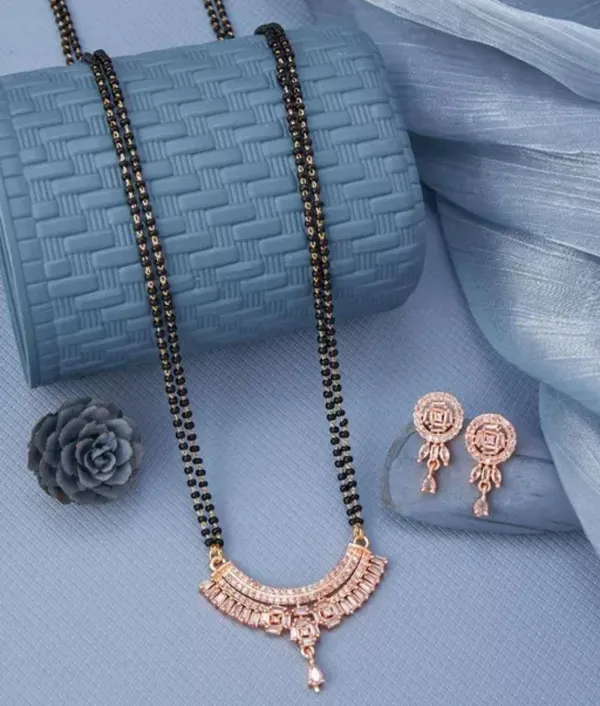 Elegant_Black_Bead_Mangalsutra_with_Rose_Gold_Pendant_and_Earrings