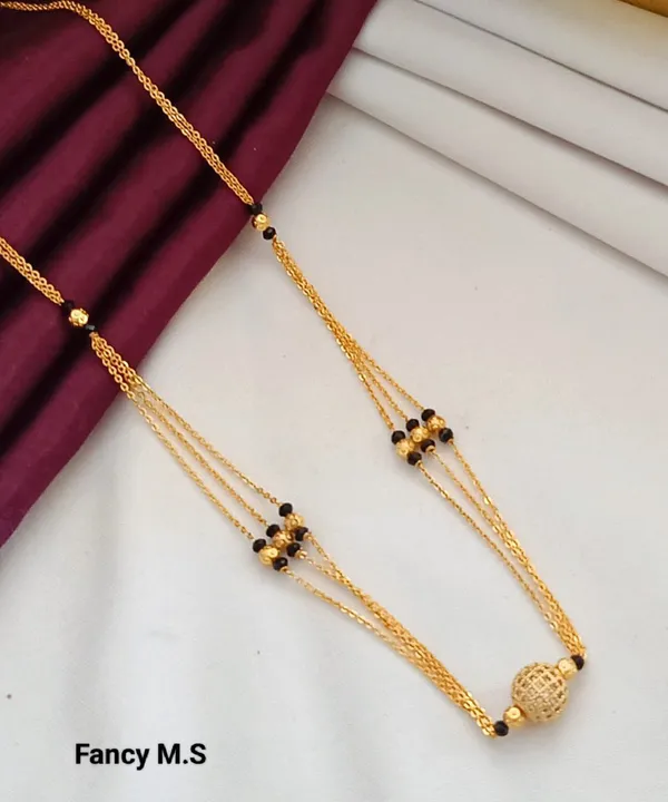 Elegant_Gold_Mangalsutra_with_Black_Beads