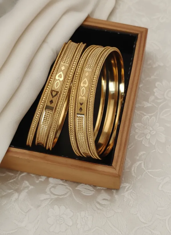 Elegant_Gold-Plated_Bangle_Set_with_Heart_and_Geometric_Motifs_Design_[2_Bangles]