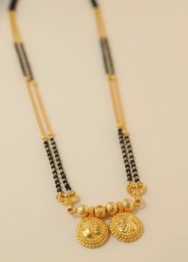 Elegant_Gold-Plated_Double_Layer_Mangalsutra_with_Traditional_Vati_Pendant