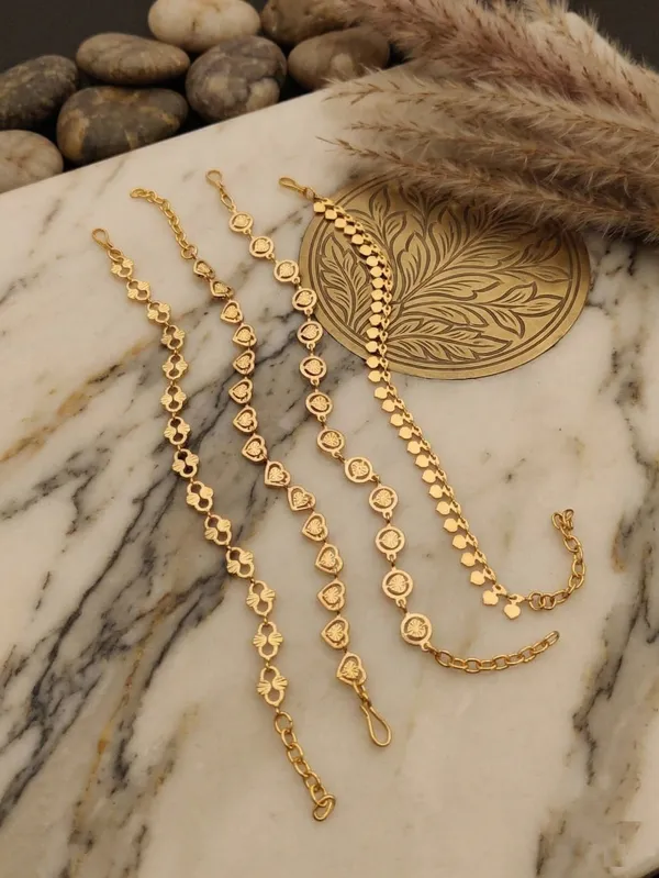 Elegant_Gold-Plated_Heart_&_Floral_Motif_Bracelet_Collection