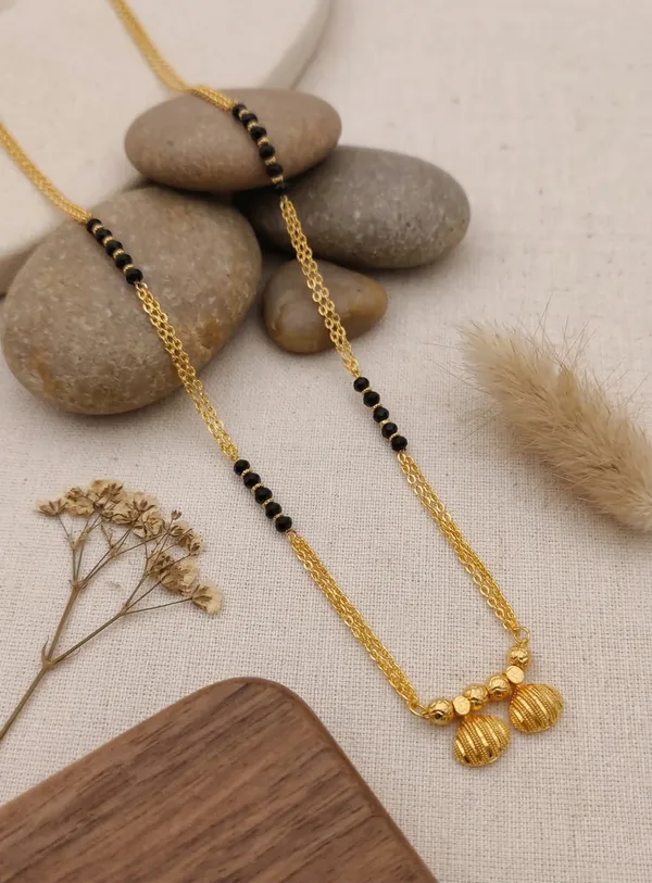 Elegant_Golden_Wati_Mangalsutra_with_Black_Beads_and_Double_Chain