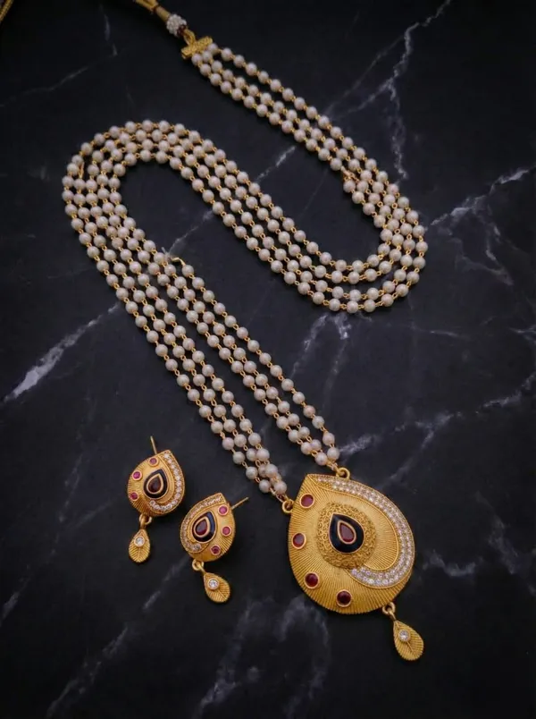 Elegant_Three-Layer_Pearl_Mala_with_Gold-Finished_Teardrop_Pendant_Set