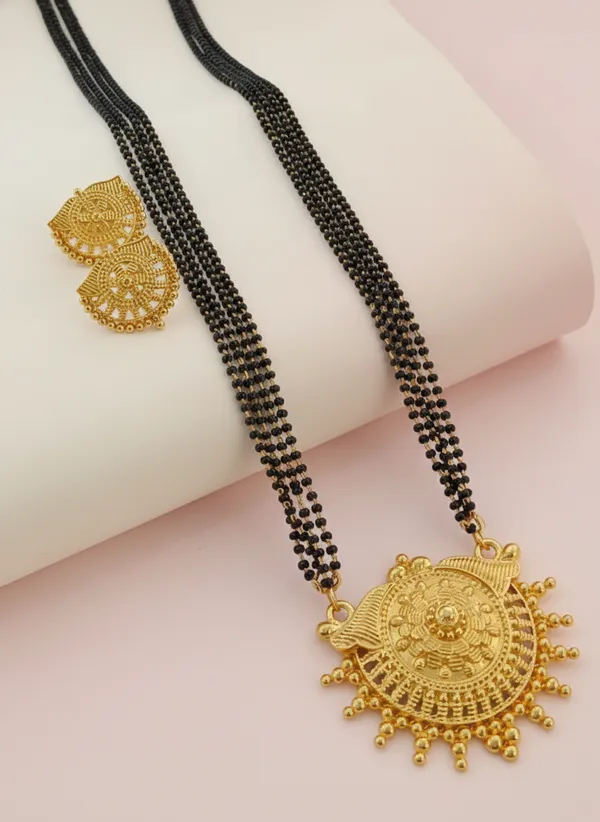 Elegant_Traditional_Gold-Plated_Mangalsutra_Set_with_Intricate_Circular_Pendant_&_Matching_Earrings