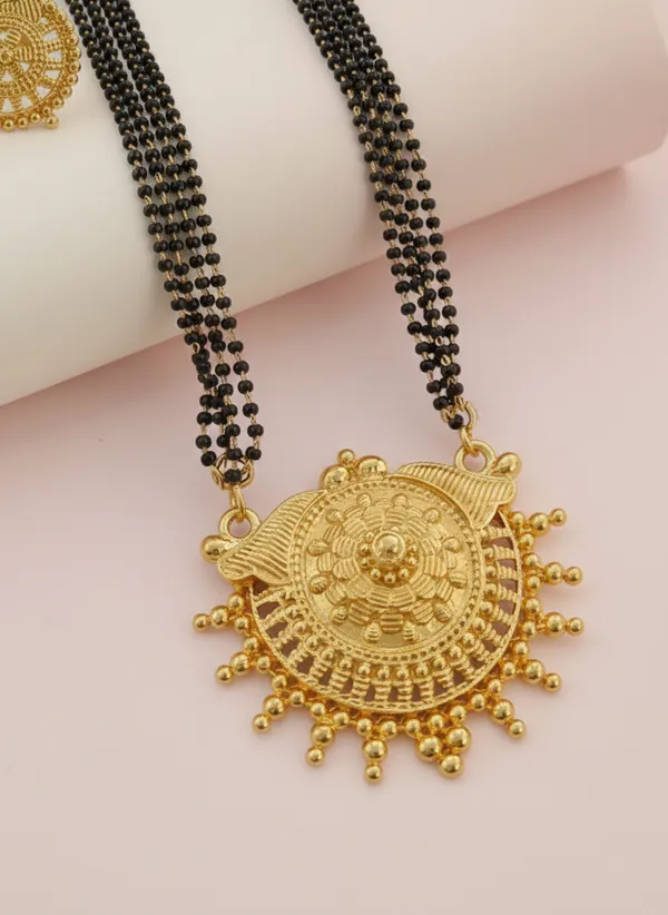 Elegant_Traditional_Gold-Plated_Mangalsutra_Set_with_Intricate_Circular_Pendant_&_Matching_Earrings
