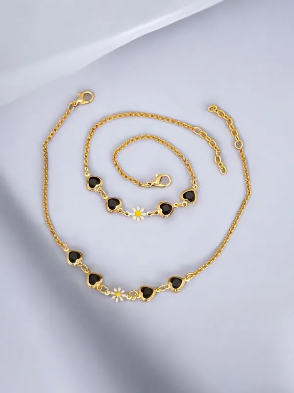 Enchanting_Gold_Anklet_with_Black_Heart_Charms_and_Daisy_Accent