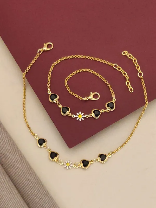 Enchanting_Gold_Anklet_with_Black_Heart_Charms_and_Daisy_Accent