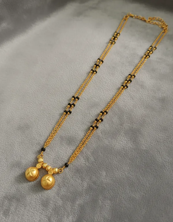 Ethnic_Gold-Toned_Layered_Chain_Necklace_with_Floral_Star_Charms