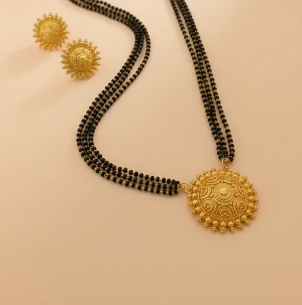 Exquisite_Triple-Strand_Gold-Plated_Mangalsutra_Set_with_Sunburst_Filigree_Pendant_and_Matching_Studs