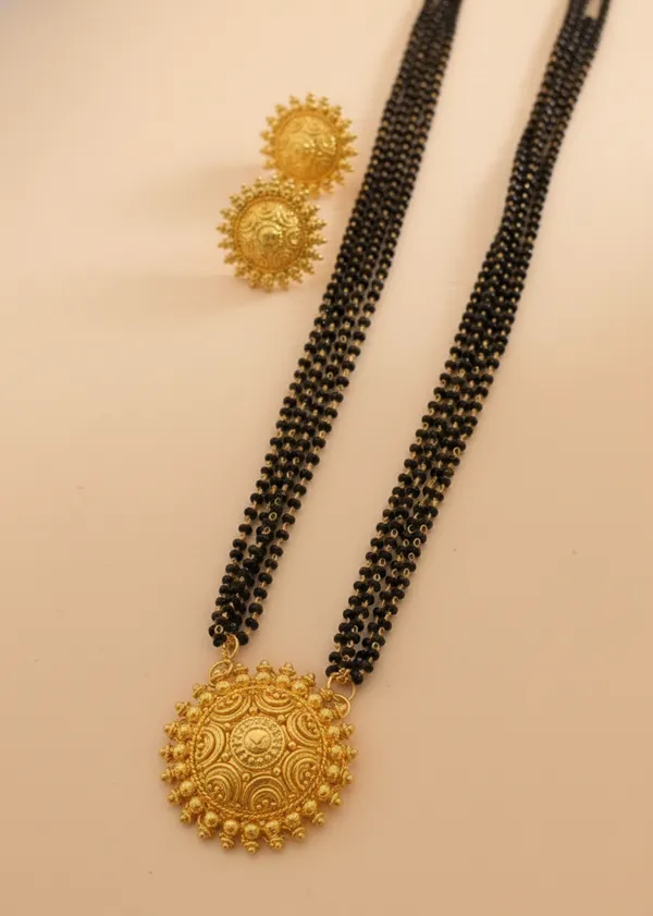 Exquisite_Triple-Strand_Gold-Plated_Mangalsutra_Set_with_Sunburst_Filigree_Pendant_and_Matching_Studs